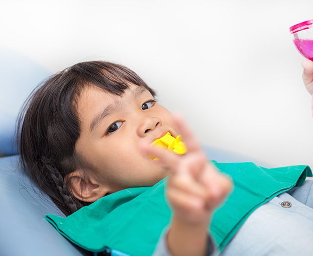 Patient receiving fluoride treatment