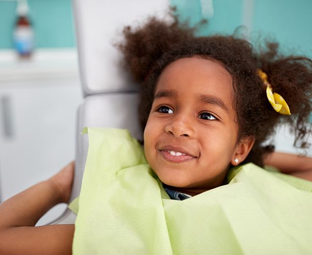 Smiling young girl during children's dentistry visit