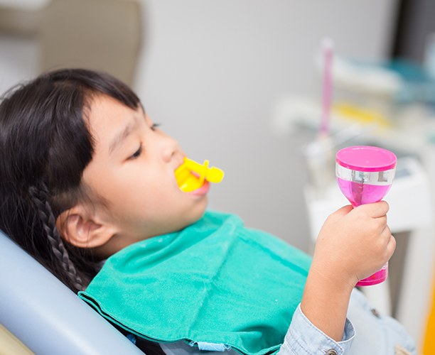 Patient receiving fluoride treatment