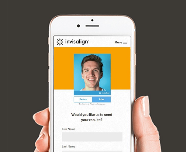 Patient using Invisalign smile view app on their phone