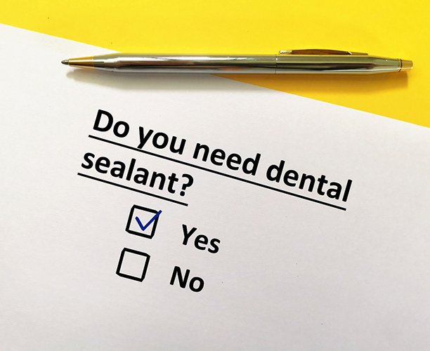 A dentist’s prescription for dental sealants on a piece of paper