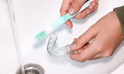 Lady brushes athletic sportsguard