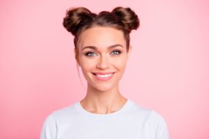 young woman smiling after teeth whitening from dentist in Las Cruces 