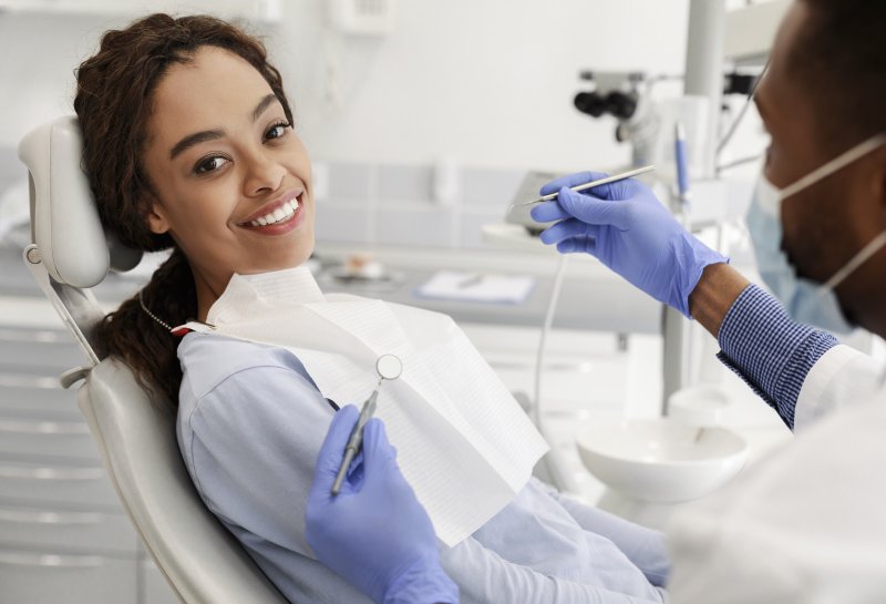 young woman in patient chair