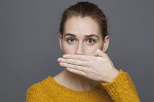 bad breath woman in close-up portrait 