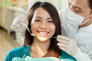 a patient visiting her dentist for preventive care 