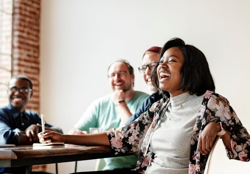 group of people smiling at work