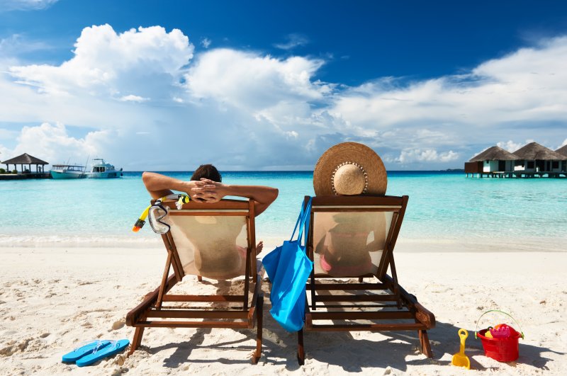 couple sitting on a beach